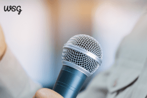 Microphone close-up, symbolizing overcoming speech anxiety during public speaking.