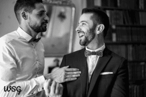 Groom and best man laughing together, ideal for best man speech examples.