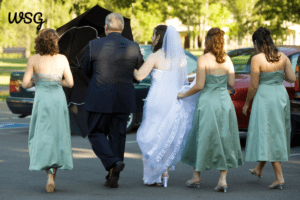 Bride walking with matron of honor and bridesmaids, perfect for a sample matron of honor speech.