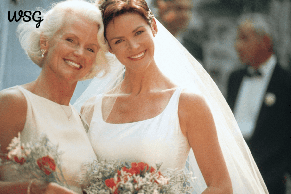 Mother and bride smiling together on the wedding day, ideal for a Mother of the Bride speech template.