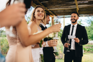 A confident wedding guest delivering a perfectly timed speech, keeping the audience engaged at a beautifully decorated wedding reception.